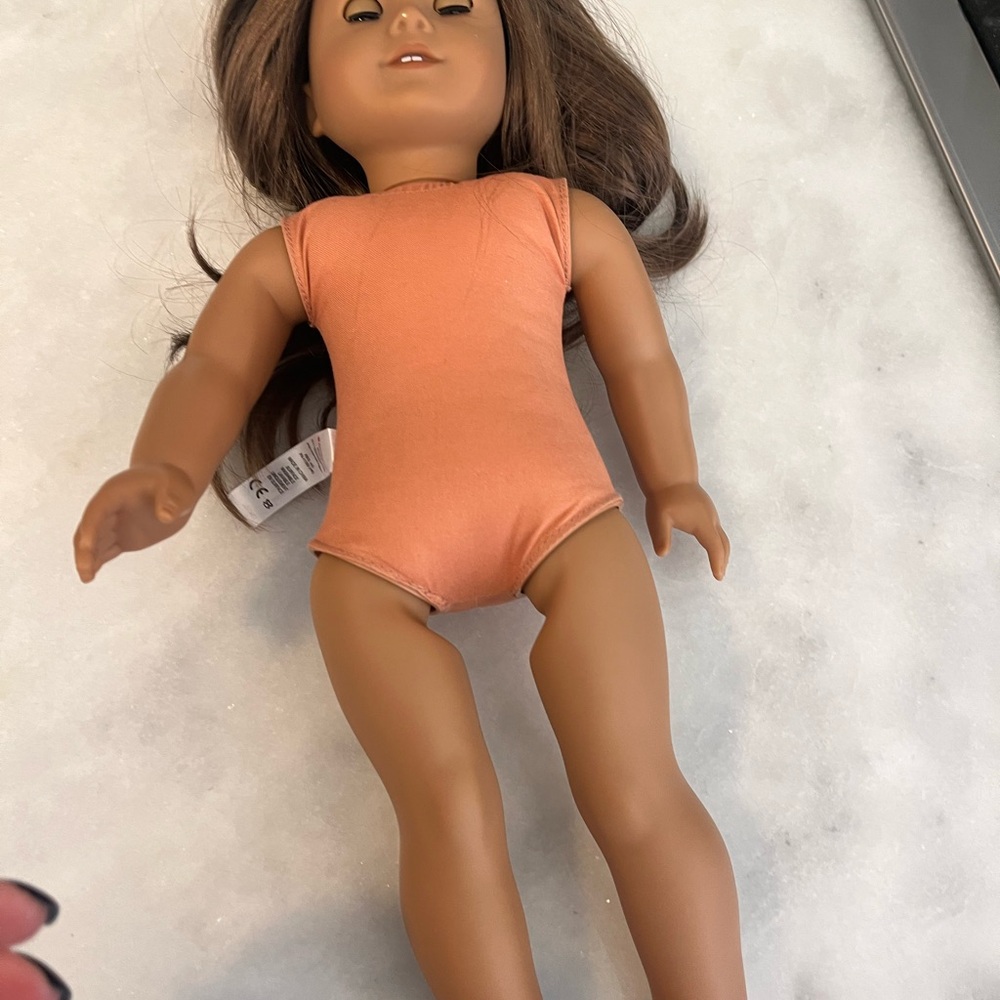 American Girl Doll with Brown Hair and Orange Outfit - Picture 2 of 6